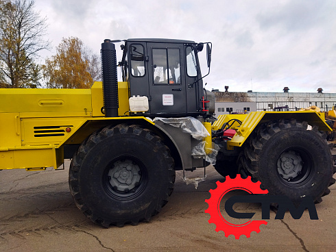 Трактор Кировец К-700 с фрезероторным снегоочистителем ФРС-3.2