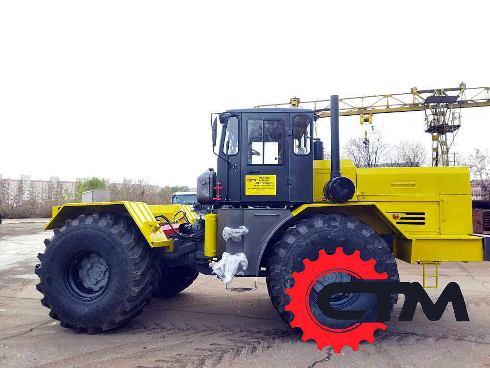 Трактор Кировец К-700 с фрезероторным снегоочистителем ФРС-3.2