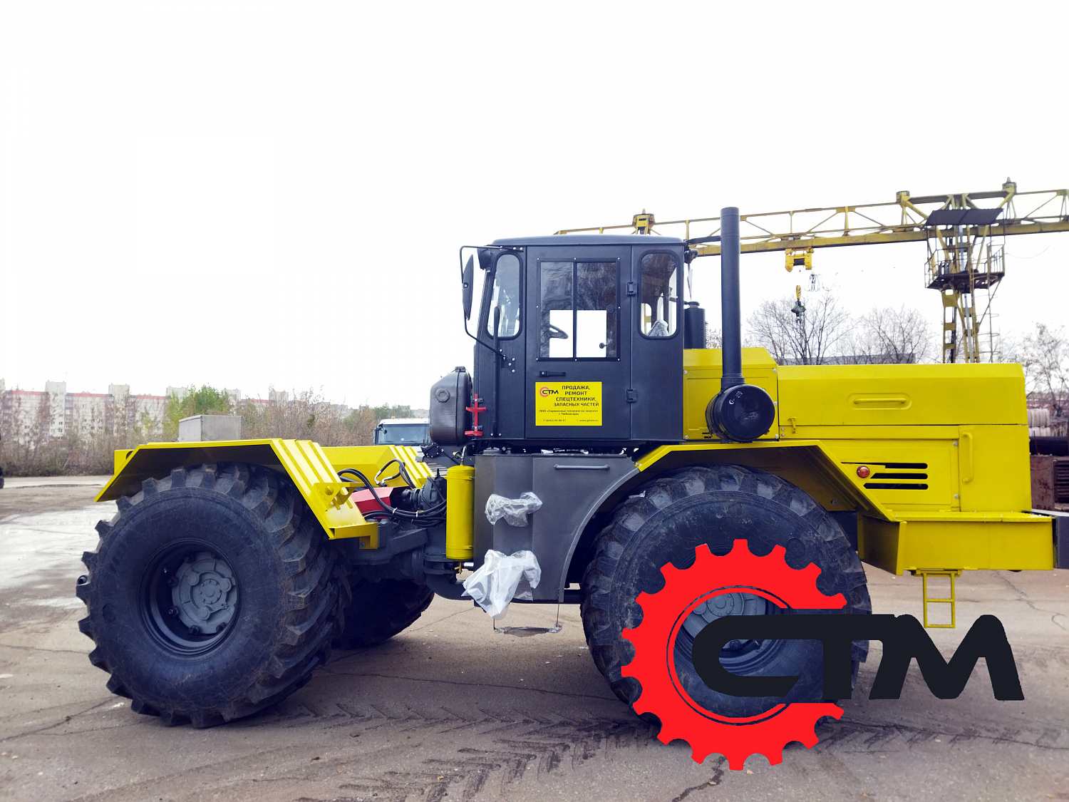 Трактор Кировец К-700 с фрезероторным снегоочистителем ФРС-3.2